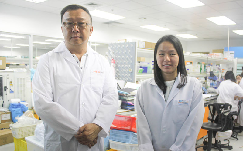 St.Herb executive with a NANOTEC researcher in the laboratory