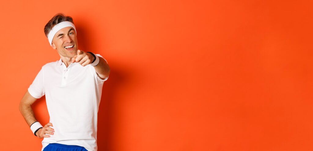 Men’s Healthcare Routines to Stay Hormone Balanced Concept Sport Fitness Lifestyle Portrait Handsome Healthy Middleaged Male Athlete Pointing 1 1024x495