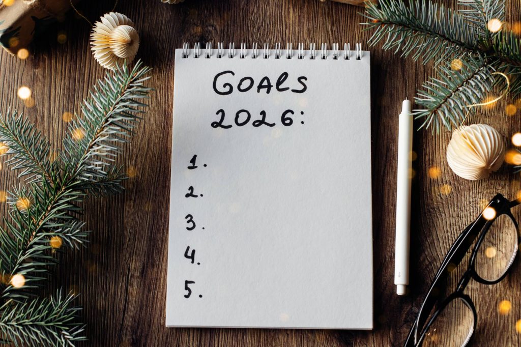 notepad with goals for 2026 surrounded by festive 2025 10 08 13 05 46 utc (1)