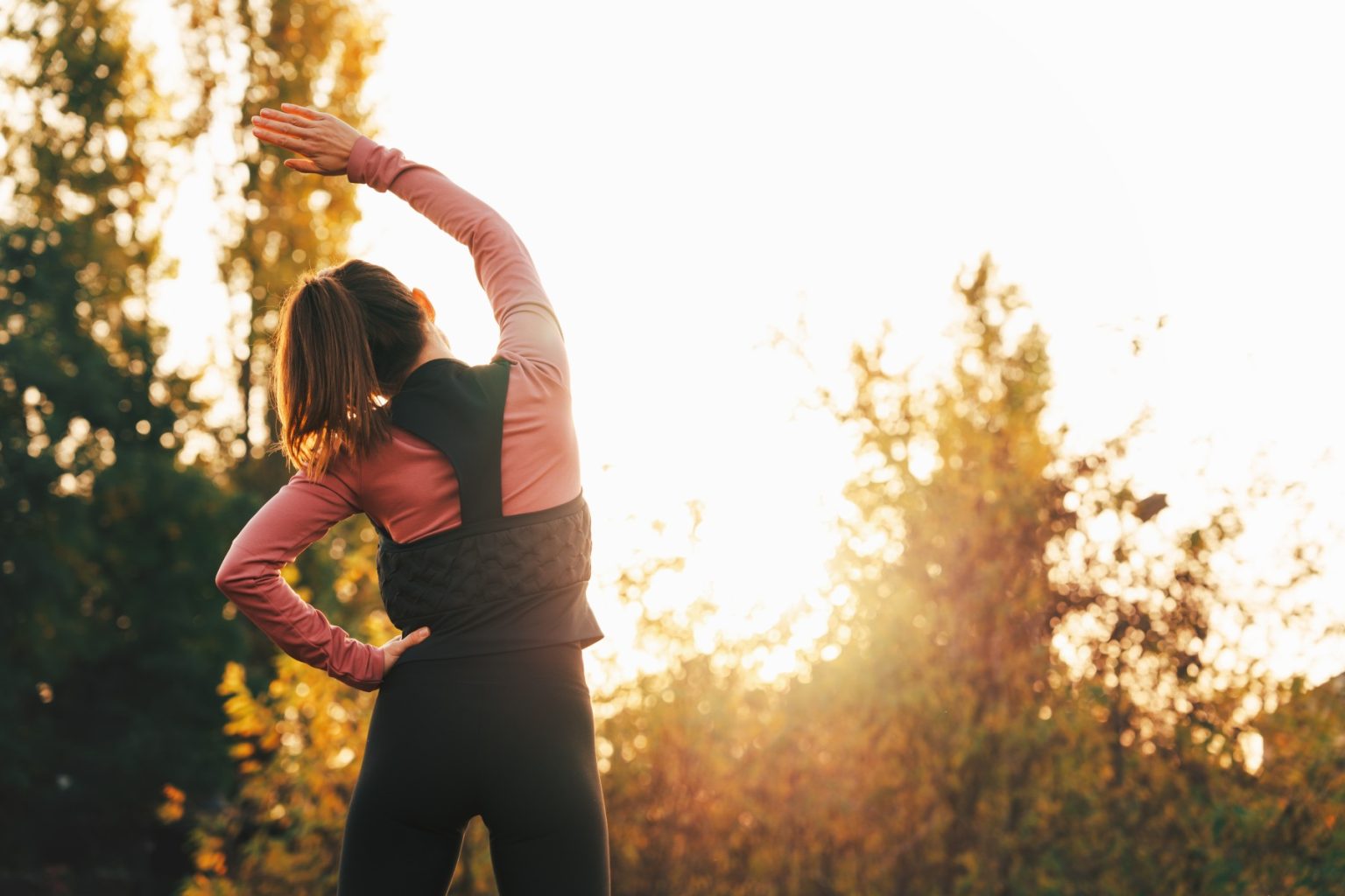 A woman maintaining a healthy lifestyle to maximize herbal effectiveness and holistic wellness
