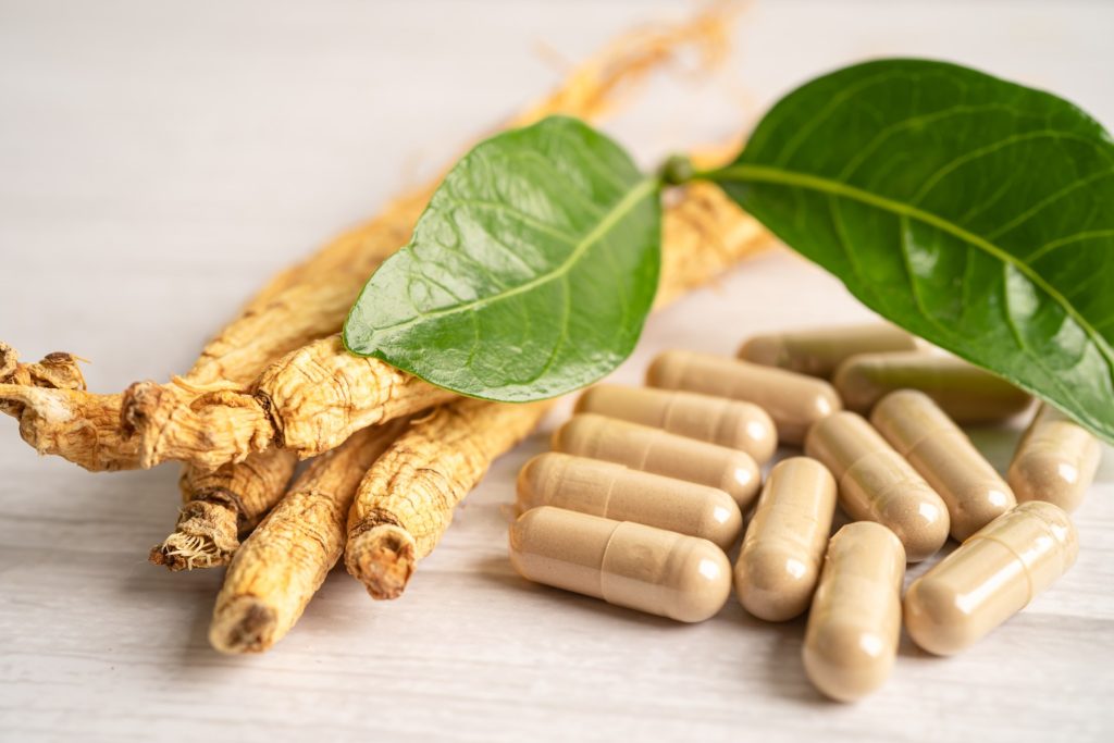 Butea superba herbal roots and capsules comparison concept